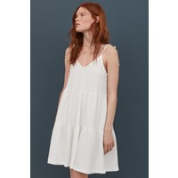 H&M Dżersejowa sukienka w serek 0873604007 Biały
