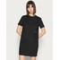 Calvin Klein Jeans OFFPLACED MONOGRAM DRESS Sukienka z dżerseju black C1821C086-Q11