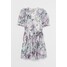 H&M Kopertowa sukienka z lyocellem 0906909002 Kremowy/ Fioletowe kwiaty