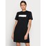 Calvin Klein Jeans HERO LOGO DRESS Sukienka z dżerseju black C1821C07Y-Q11