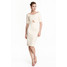 H&M Dopasowana sukienka 0408033003 Naturalna biel