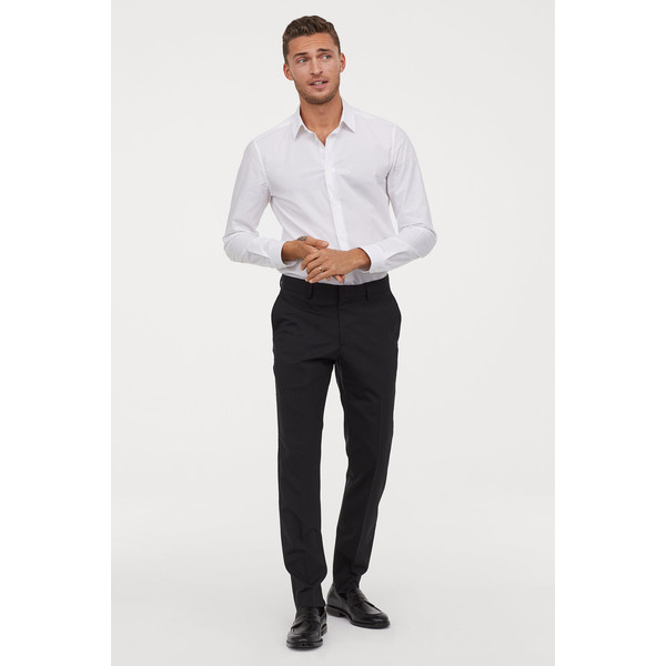 H&M Wełniane spodnie Slim Fit 0755644003 Czarny