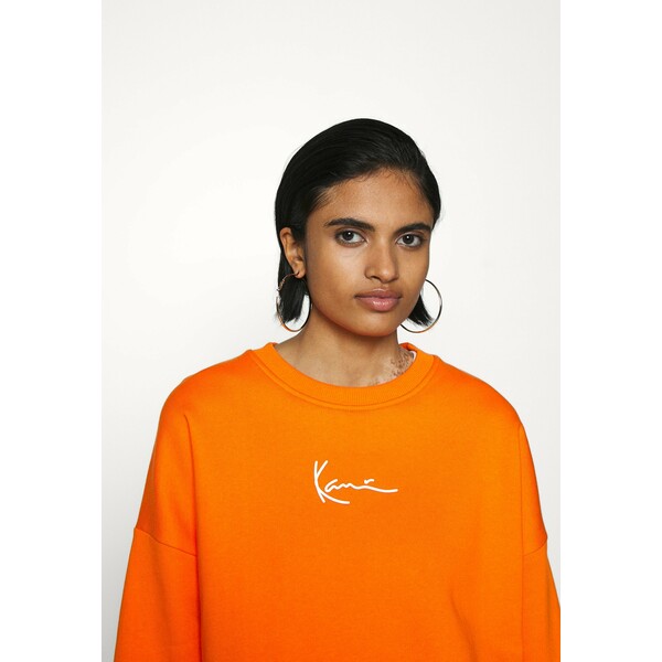 Karl Kani SMALL SIGNATURE CREW Bluza orange KK121J00R