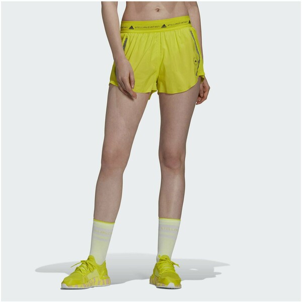 adidas by Stella McCartney TRUEPACE Krótkie spodenki sportowe acid yellow AD741E06E