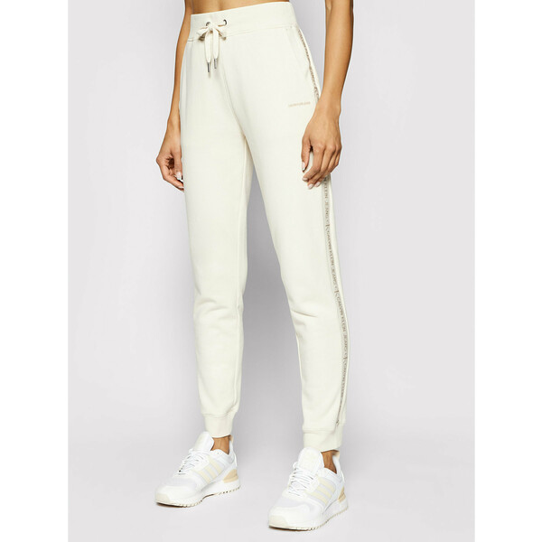 Calvin Klein Jeans Spodnie dresowe J20J215458 Beżowy Tapered Fit