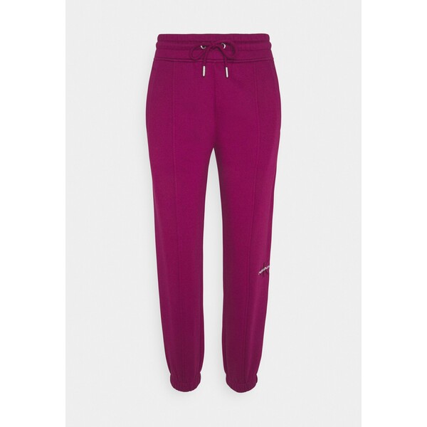 Calvin Klein Jeans OFF PLACED MONOGRAM PANT Spodnie treningowe purple C1821A048