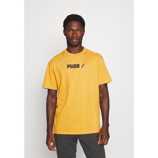 Puma RAD/CAL TEE T-shirt z nadrukiem mineral yellow PU142D188-H11