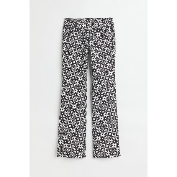 H&M Rozszerzane spodnie z diagonalu Low Waist - 1044156004 Biały/Kwiaty