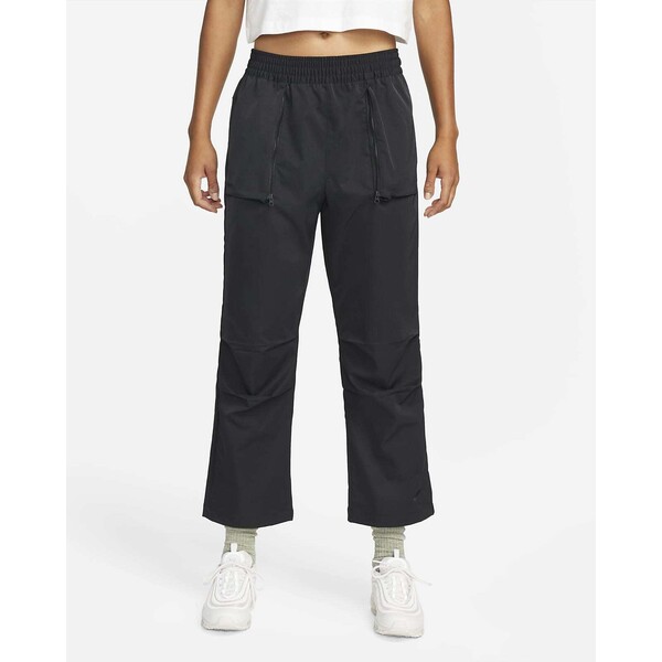 Damskie spodnie z tkaniny ze średnim stanem Nike Sportswear Dri-FIT Tech Pack