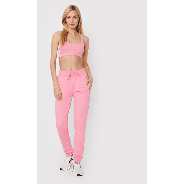 adidas Spodnie dresowe adicolor Essentials HJ7848 Różowy Slim Fit