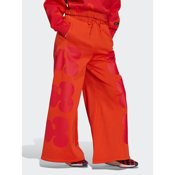 adidas Spodnie dresowe MARIMEKKO HH8751 Pomarańczowy Loose Fit