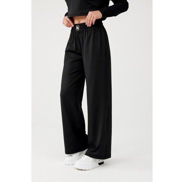 ROUGH RADICAL Spodnie dresowe OLIMP LOOSE PANTS Czarny Relaxed Fit