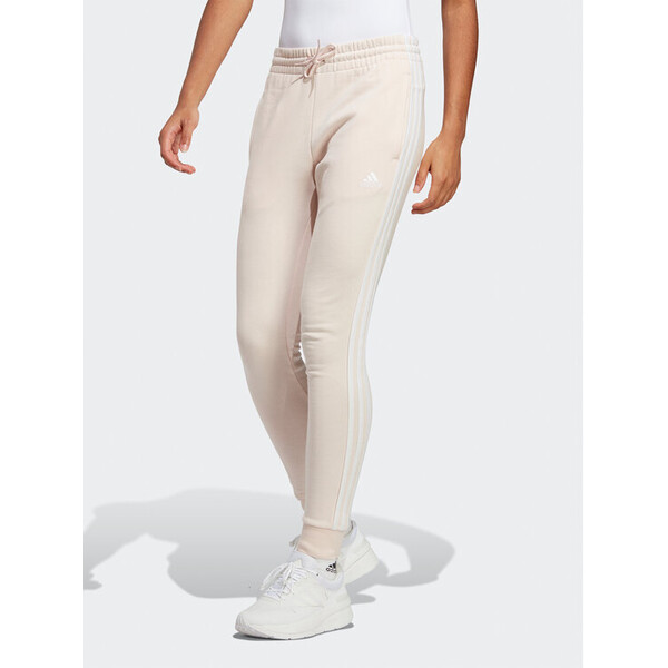 adidas Spodnie dresowe Essentials 3-Stripes French Terry Cuffed Joggers IC9924 Różowy Slim Fit
