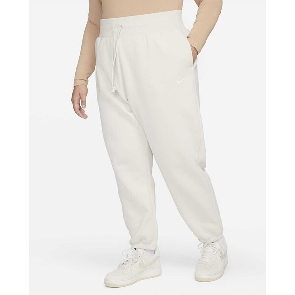 Damskie spodnie dresowe o kroju oversize i wysokim stanem (duże rozmiary) Nike Sportswear Phoenix Fleece DV4919-104