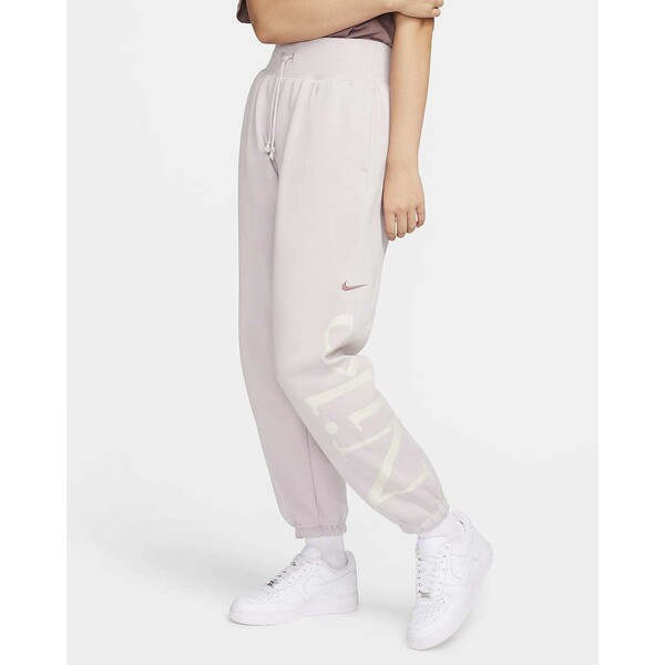 Damskie spodnie dresowe o kroju oversize z logo Nike Sportswear Phoenix Fleece FN2552-019