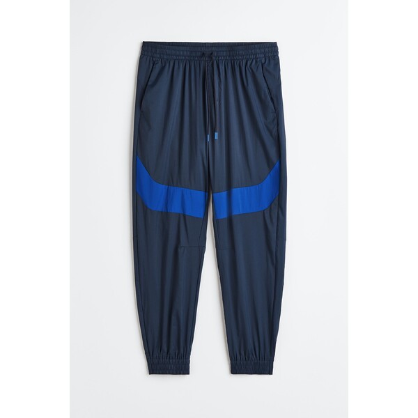 H&M Wodoodporne spodnie sportowe - - ON 1119353001 Ciemnoniebieski/Niebieski