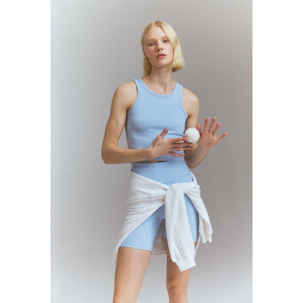 H&M Krótka bezszwowa koszulka sportowa DryMove™ - Okrągły dekolt - Bez rękawów - -ONA 1222123005 Jasnoniebieski