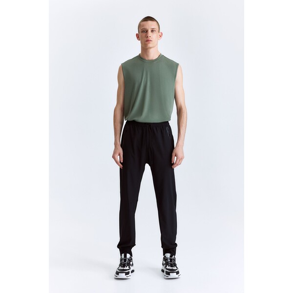 H&M Sportowa koszulka DryMove™ - Okrągły dekolt - Bez rękawów - - ON 1198604005 Zieleń khaki