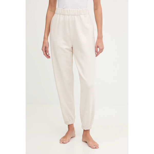 JOYINME spodnie dresowe Kind  kolor beżowy gładkie Kind