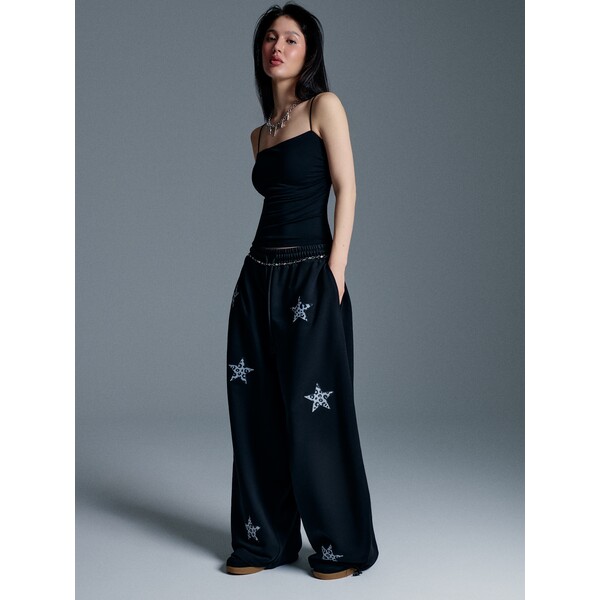 House Czarne spodnie wide leg z aplikacją gwiazdek w panterkę 784KS-99X