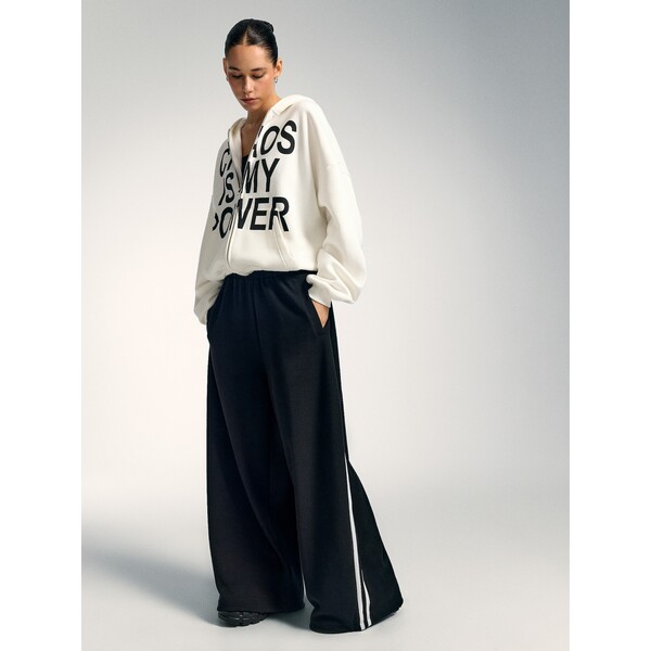 House Czarne spodnie wide leg fit z kontrastowymi lampasami 731MD-99X