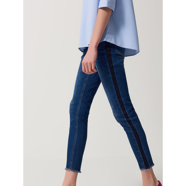 Mohito Jeansowe spodnie z surowym wykończeniem nogawek RI756-50J