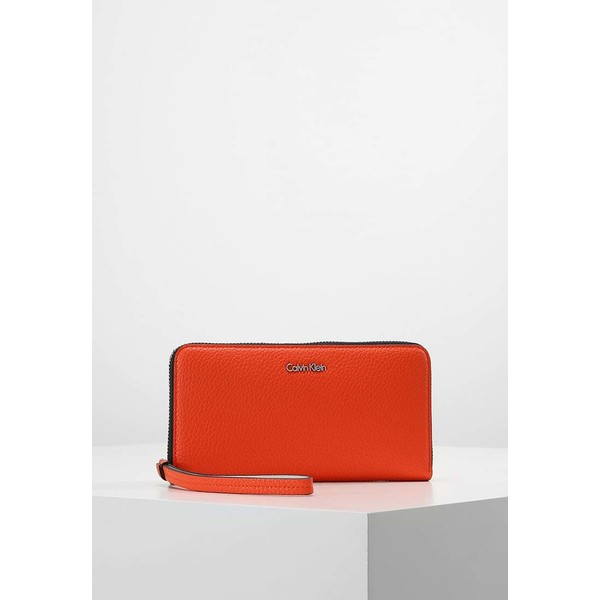 Calvin Klein EDIT LARGE ZIP AROUND Portfel orange 6CA51F024