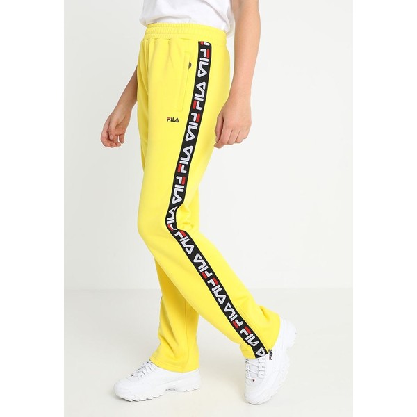 Fila THORA TRACK PANTS Spodnie treningowe vibrant yellow 1FI21A00F